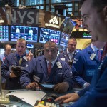 Traders work on the floor of the New York Stock Exchange Traders work on the floor of the New York Stock Exchange