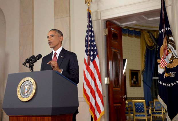 U.S. President Obama delivers a live televised address to the nation on his plans for military action against the Islamic State, from the Cross Hall of the White House in Washington
