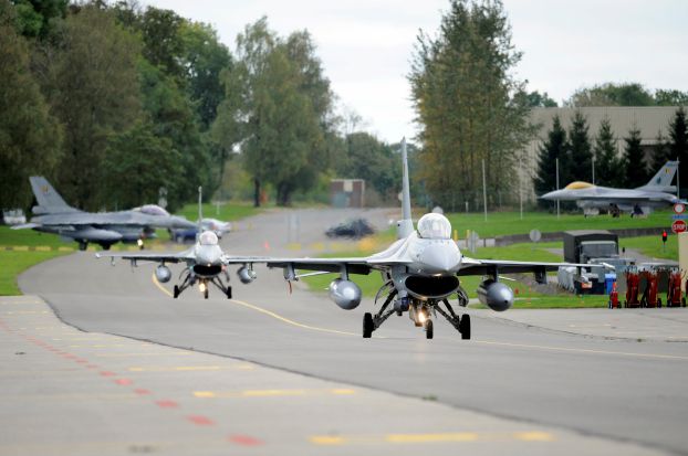 Belgian F-16 fighter jets are on their way to take off to join an international coalition fighting against the Islamic State (IS), at the military airbase in Florennes
