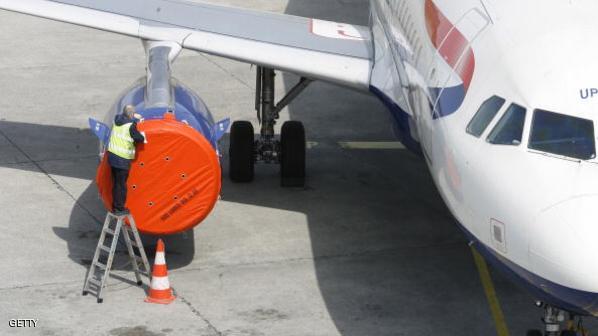 A technician controls the engine of an a