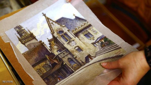 Employee puts away watercolour by Hitler at auction house in Nuremberg