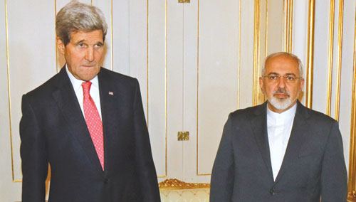 وزير الخارجية الأميركي كيري مع نظيره الإيراني ظريف