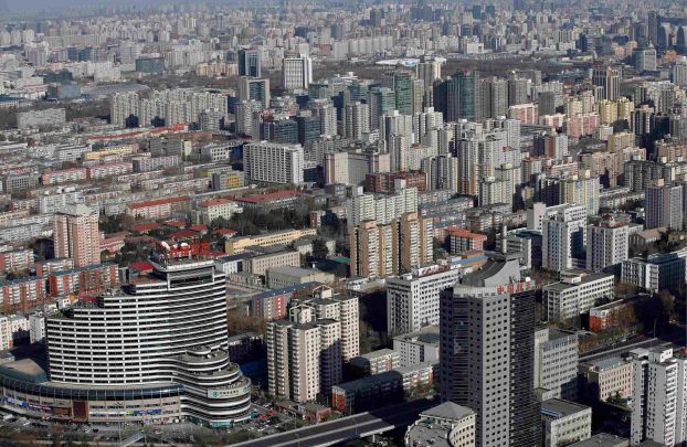 Buildings are seen from China Central Radio and Television Tower on a sunny day in Beijing