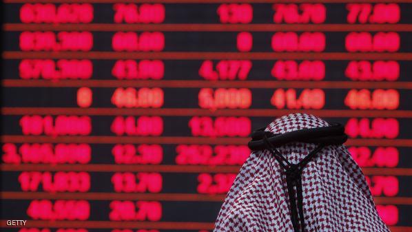 A Qatari investor follows the stock mark